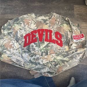 hazel Red and White Patch on Camo Fabric